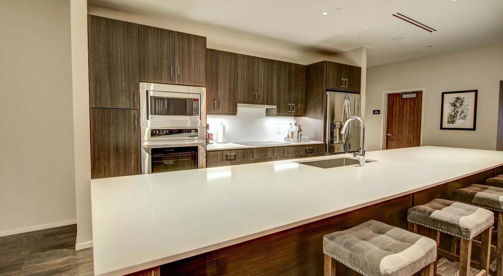 Spacious kitchens with thoughtful details a kitchen with a large island