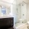 well lit vanity/sink in bathroom