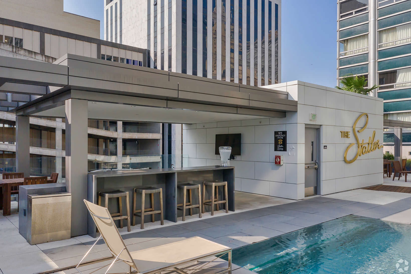 Poolside Kitchen pool next to covered kitchen area